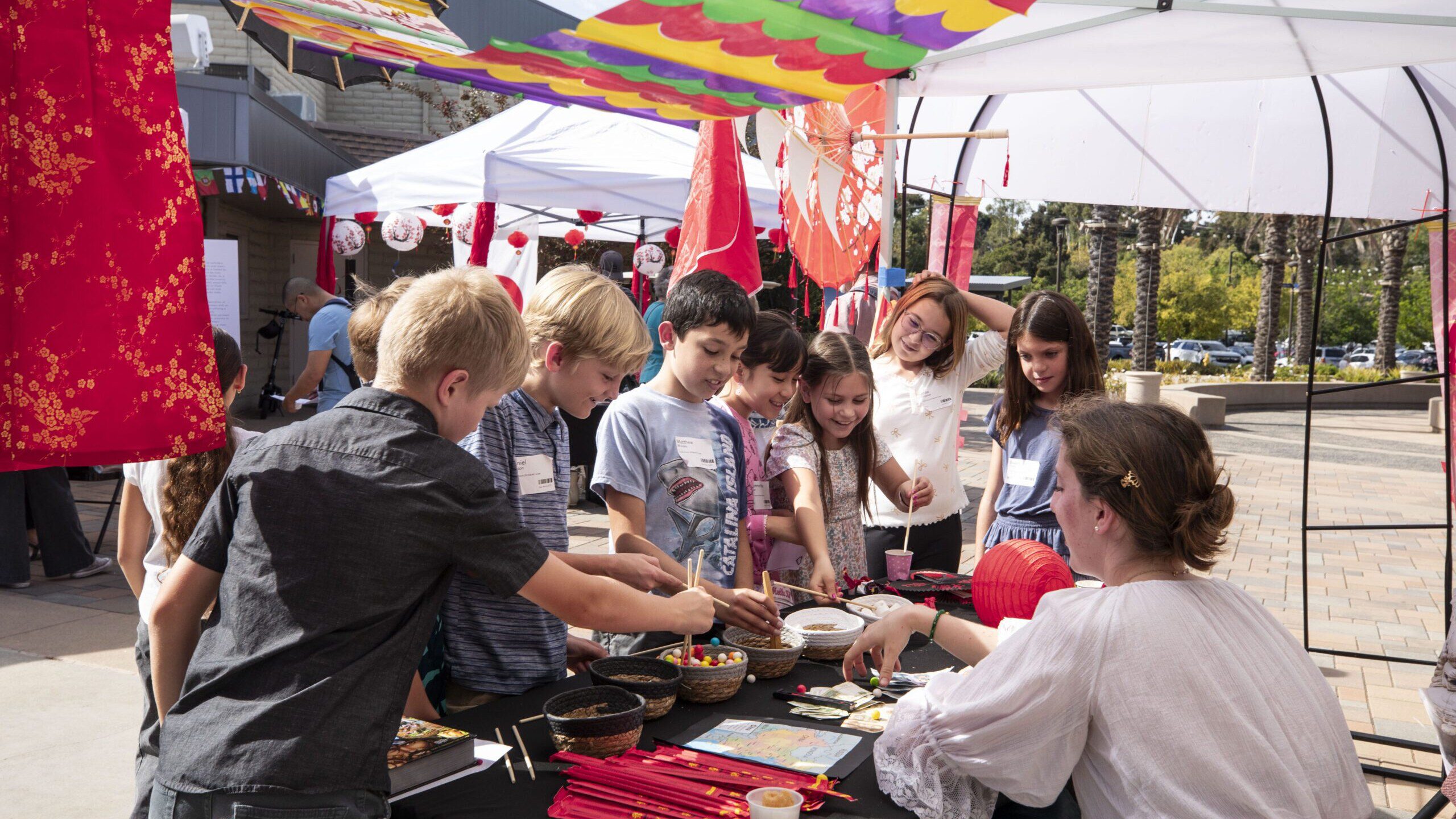 People Around Info Booth | Global Sunday | Emmanuel Faith Community Church